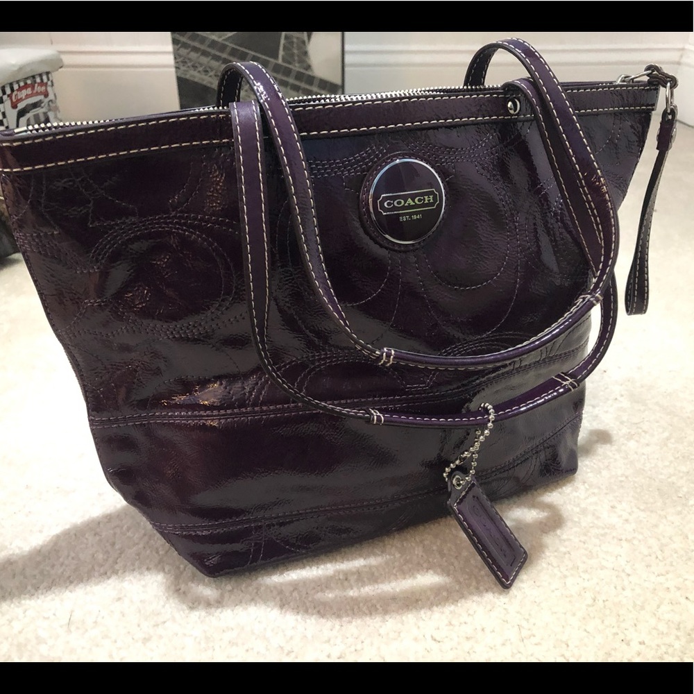 Purple leather coach purse